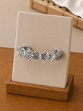 BRAZALETE ACERO CONCHAS