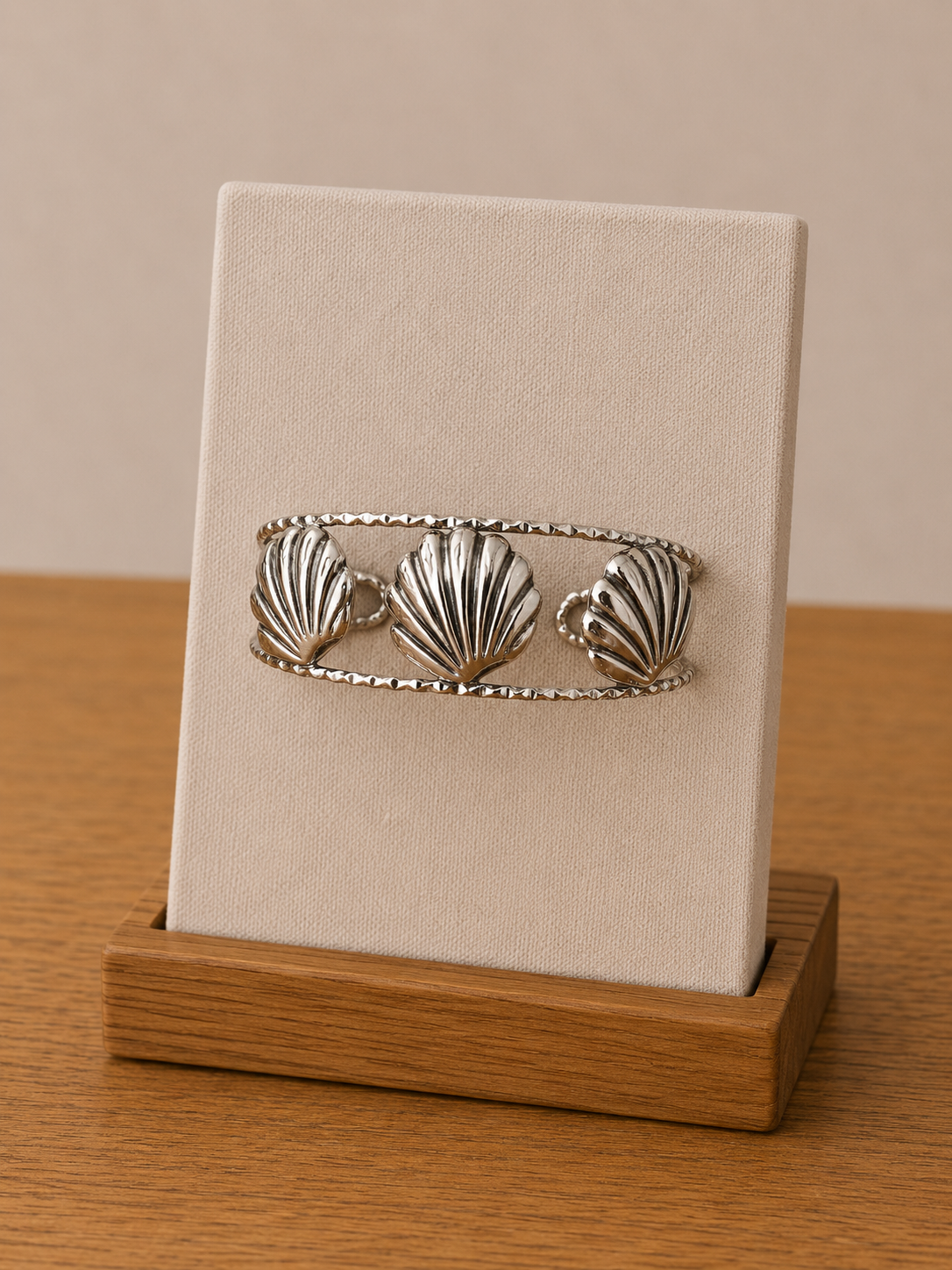 BRAZALETE ACERO TRIPLE CONCHA