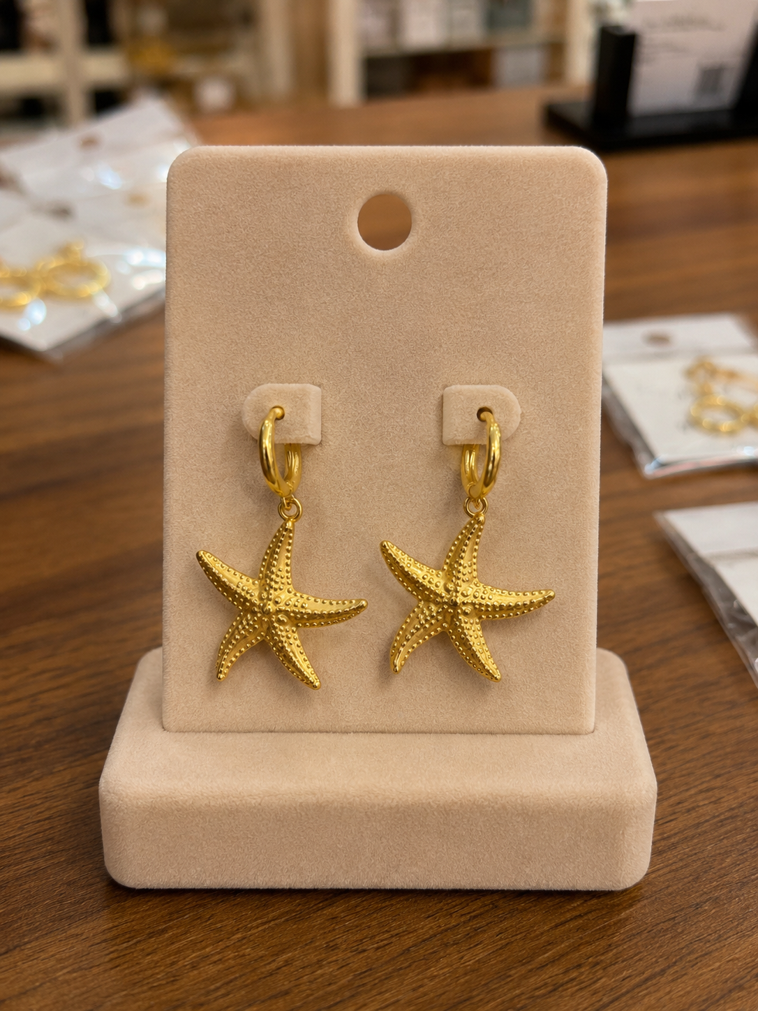 PENDIENTES ACERO ESTRELLA COLGANTE